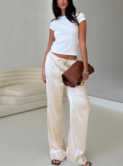 front view of model wearing Princess Polly Soulstar Satin Pants Champagne Low Rise Pants 