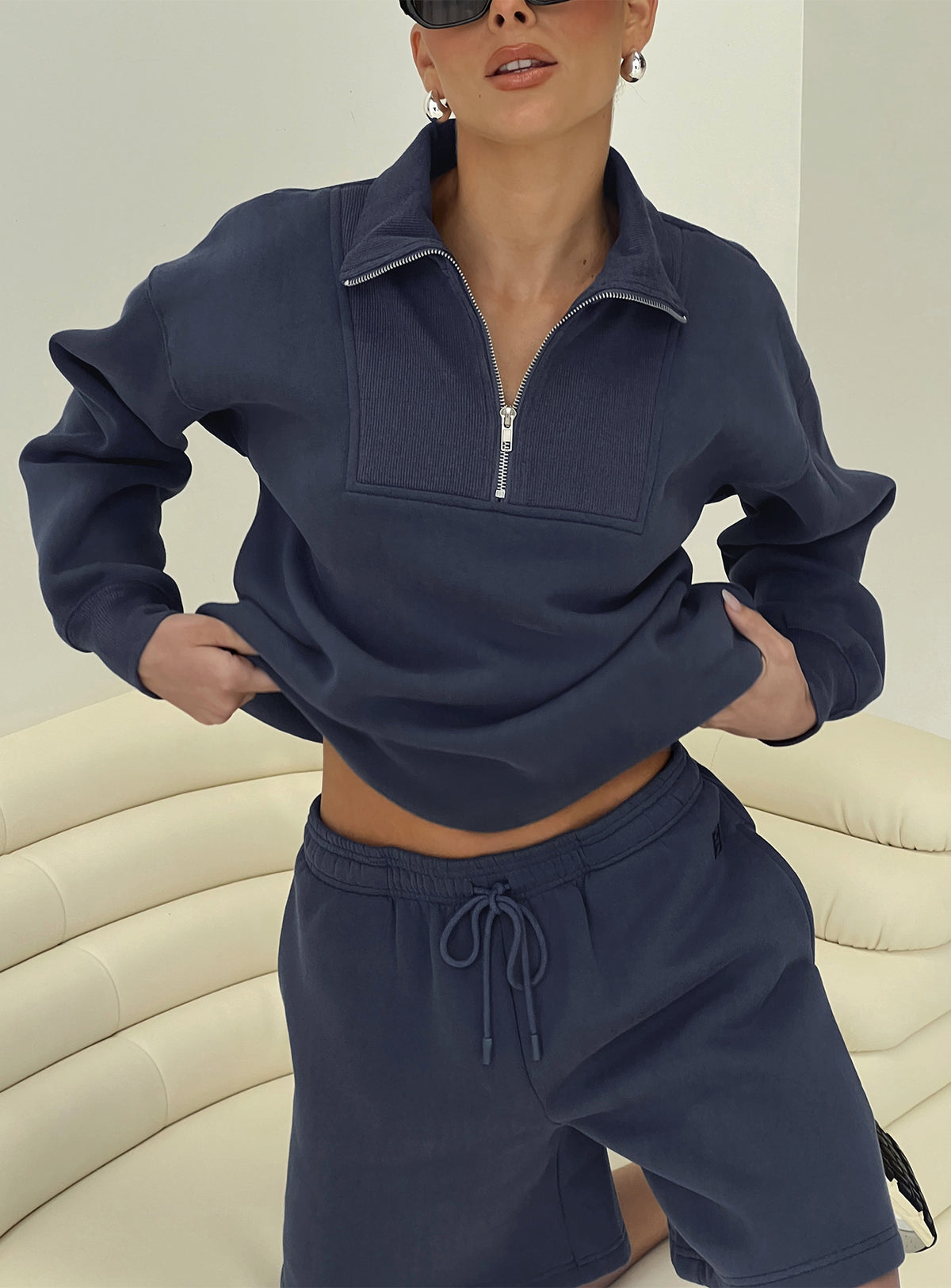 front view of model wearing Princess Polly Dream Fleece Quarter Zip Sweatshirt Navy Jumpers 