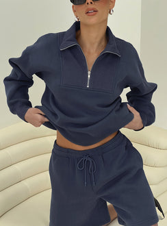 front view of model wearing Princess Polly Dream Fleece Quarter Zip Sweatshirt Navy Jumpers 