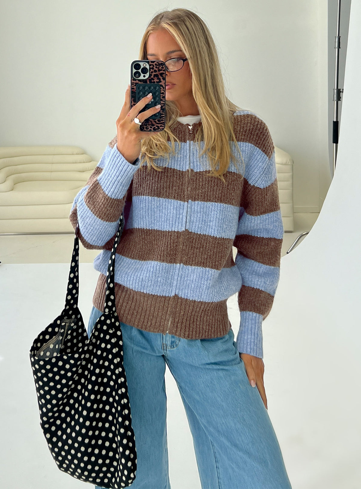 Featuring the Queena Zip Through Knit Sweater Blue Stripe in womens-jumpers with long fit front view of model wearing Princess Polly