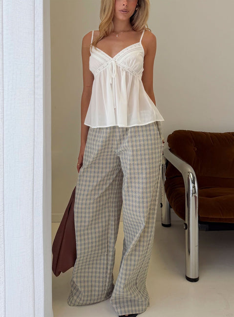 Showcasing Lunea Concealed Waistband Pants Multi Check womens-regular-pants with high-rise in checkered wide-leg front view of model wearing Princess Polly