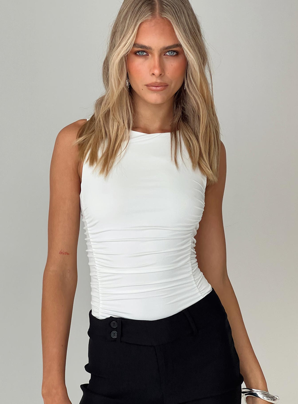 front view of model wearing Princess Polly Pizarro Bodysuit White Sleeveless Bodysuit 