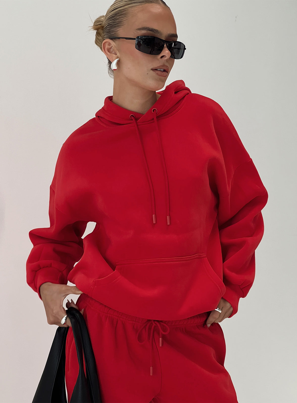 front view of model wearing Princess Polly Dream Fleece Classic Hoodie Red Longline Jumpers Jumpers 