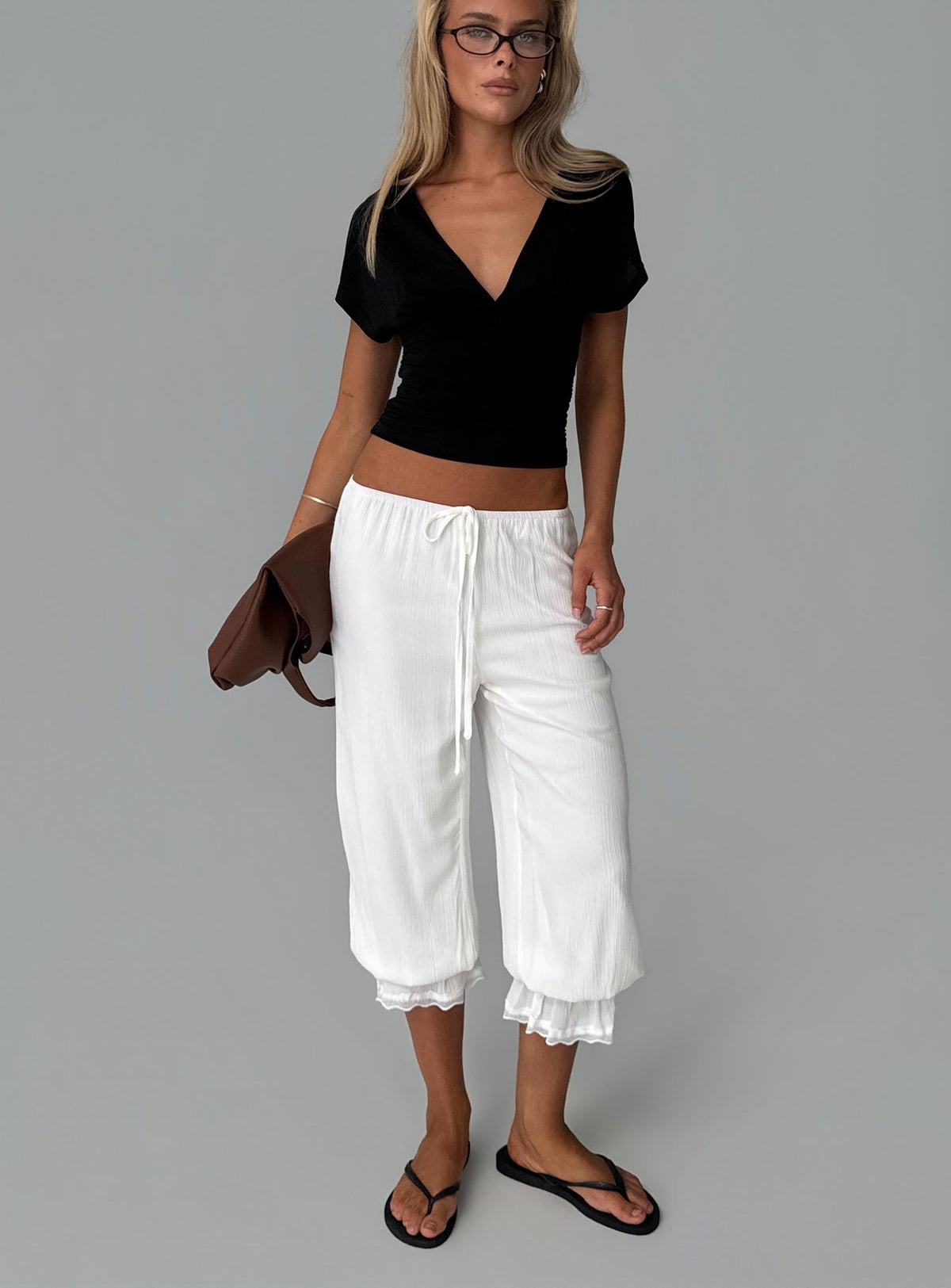 front view of model wearing Princess Polly Basma Bloomer Trouser Pants Rayon White Mid Rise Pants Pants 