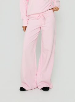 Featuring Dodie Wide Leg Pants Pink in womens regular pants with mid-rise front view of model wearing