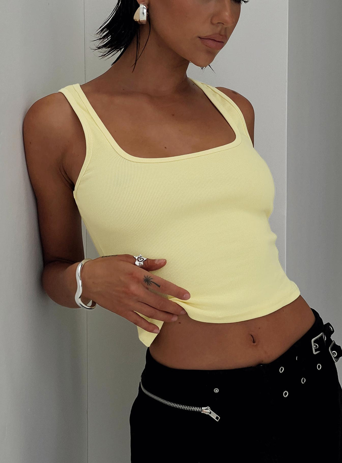 back view of model wearing Princess Polly Baseline Square Neck Rib Tank Top Lemon Sleeveless Square Neck 