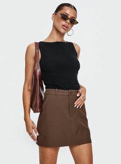   side view of model wearing Princess Polly Sabyna Tailored Mini Skirt Brown Mini Skirts Skirts 
