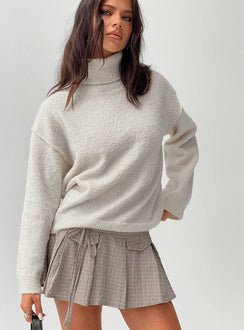 side view of model wearing Princess Polly Finnien Boucle Turtleneck Sweater Cream Longline Jumpers Jumpers 