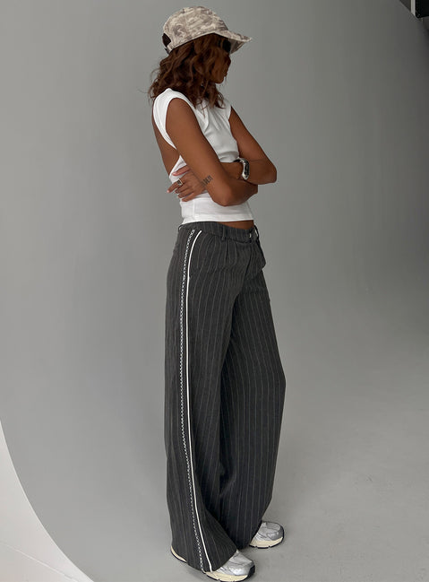 back view of model wearing Princess Polly Knowla Pleated Trouser Pant Grey Pinstripe Mid Rise Pants Pants 