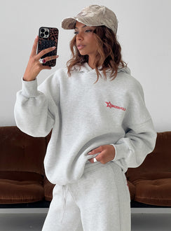 Showcasing the Stargirl Hoodie Grey Marle in womens jumpers with long length front view of model wearing Princess Polly