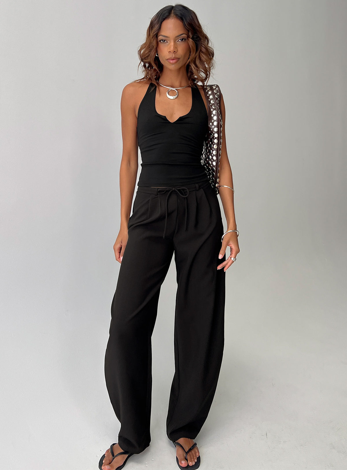 front view of model wearing Princess Polly Triffid Barrel Leg Pants Black High Rise Pants Pants 
