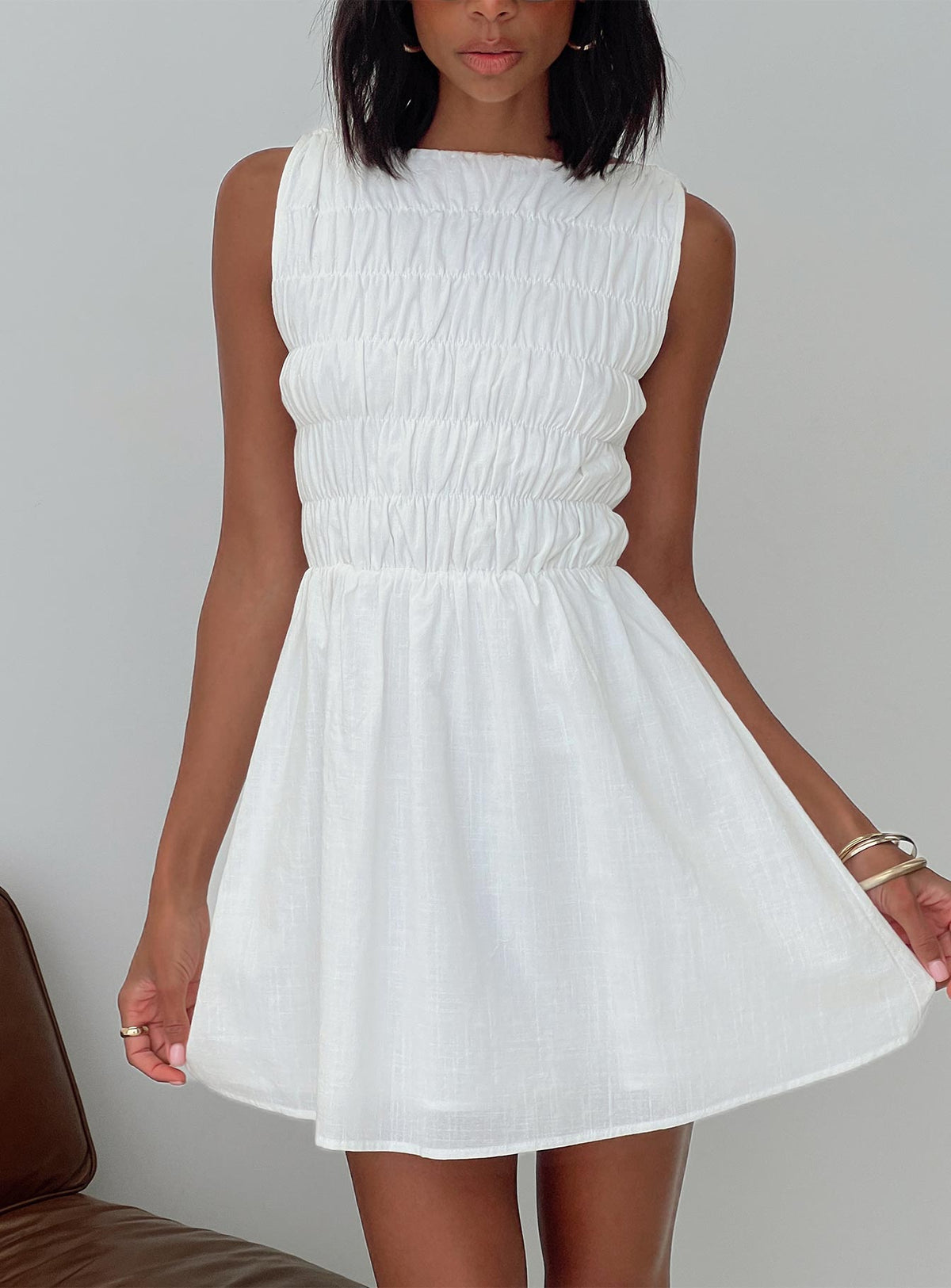 front view of model wearing Princess Polly Melona Shirred Mini Dress White Boat Neck 