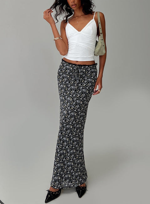   front view of model wearing Princess Polly Emily Maxi Skirt Blue / Black Floral Maxi Skirts Skirts 