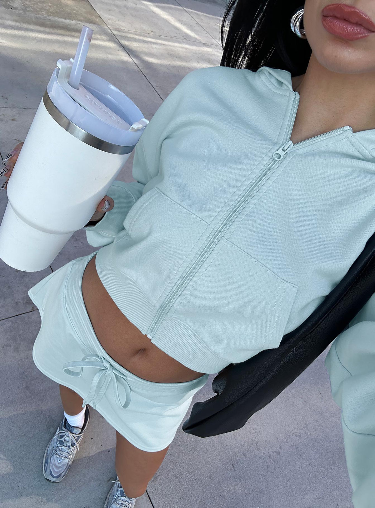 back view of model wearing Princess Polly Revive Zip Through Hoodie Blue cropped Jumpers 