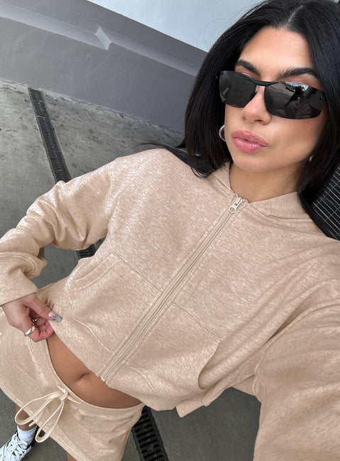 side view of model wearing Princess Polly Revive Zip Through Hoodie Oat Marle cropped Jumpers 