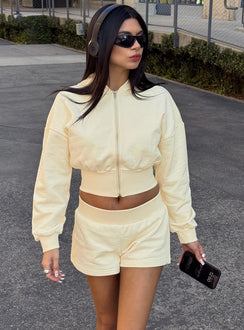 front view of model wearing Princess Polly Daytime Cropped Blouson Hoodie Buttercream Cropped Jumpers Jumpers 