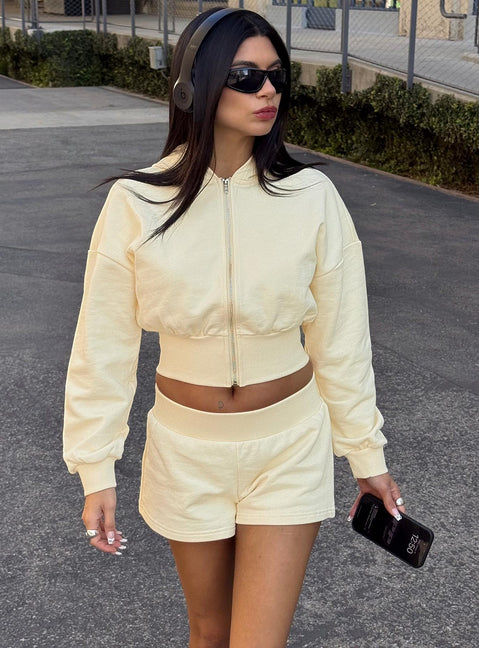 front view of model wearing Princess Polly Daytime Cropped Blouson Hoodie Buttercream Cropped Jumpers Jumpers 