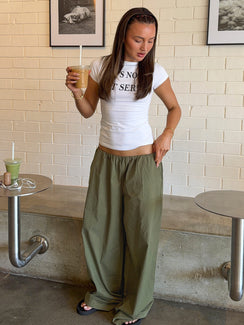 Featuring the Lunea Concealed Waistband Pants Khaki womens-regular-pants with high-rise front view of model wearing Princess Polly