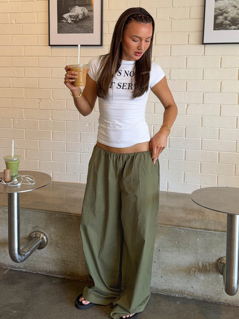 Featuring Lunea Concealed Waistband Pants Khaki Petite in mid-rise womens-regular-pants front view of model wearing Princess Polly