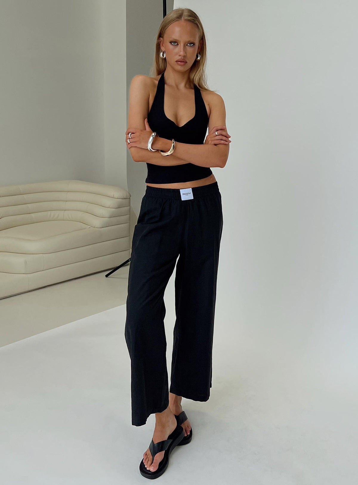 back view of model wearing Princess Polly Beach House Pants Black Low Rise Pants Pants 