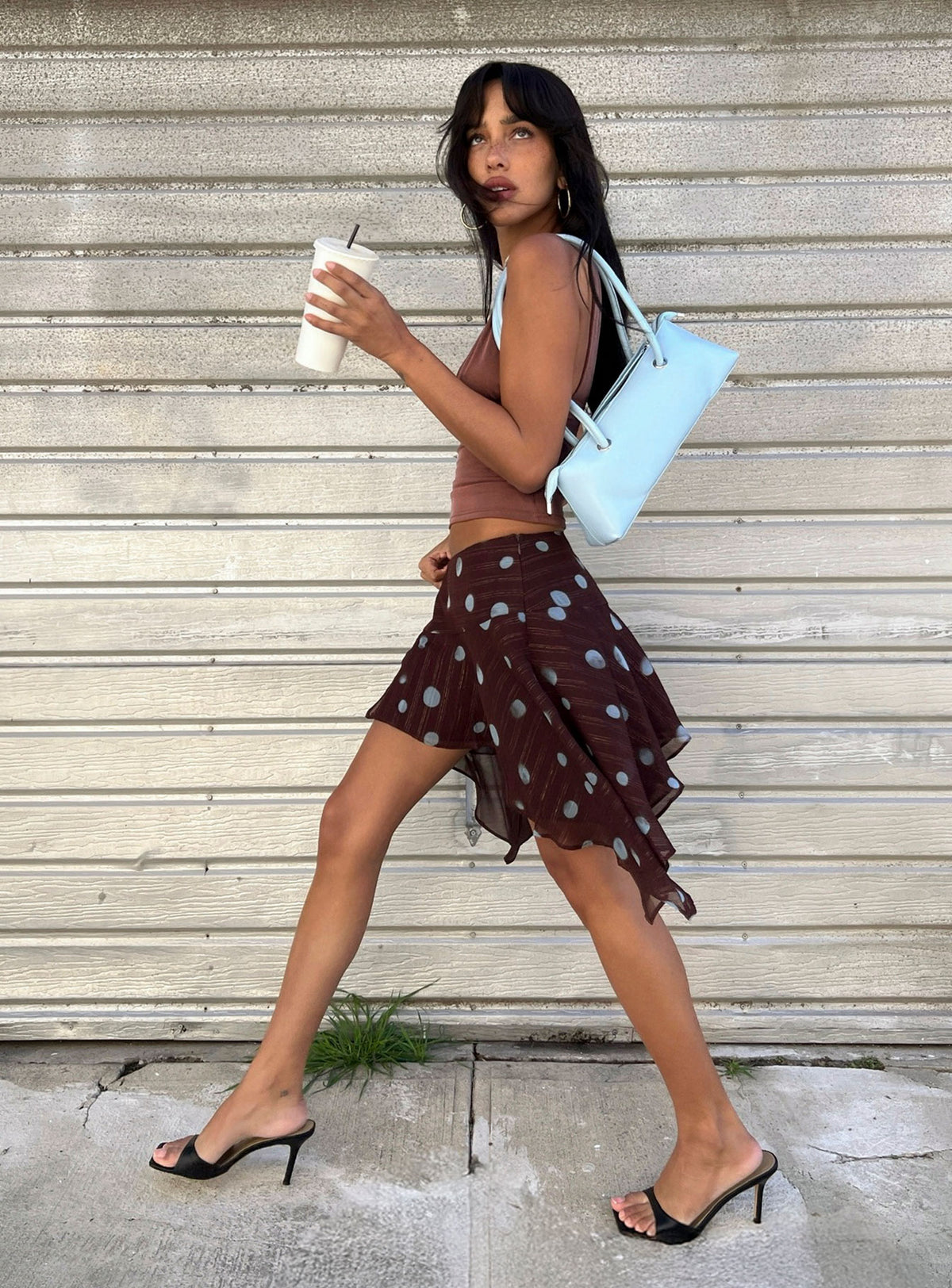   side view of model wearing Princess Polly Hevenna Asymmetrical Chiffon Mini Skirt Brown / Blue Polka Mini Skirts Skirts 
