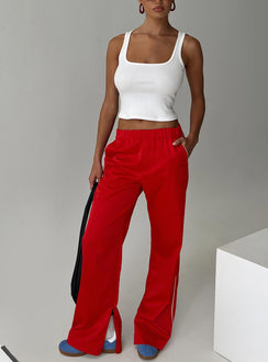 front view of model wearing Princess Polly Travalta Satin Track Pant Red Low Rise Pants Pants 