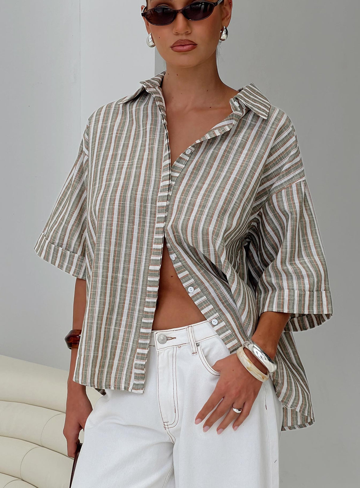 front view of model wearing Princess Polly Qualley Top Multi Half Sleeves V-Neck 