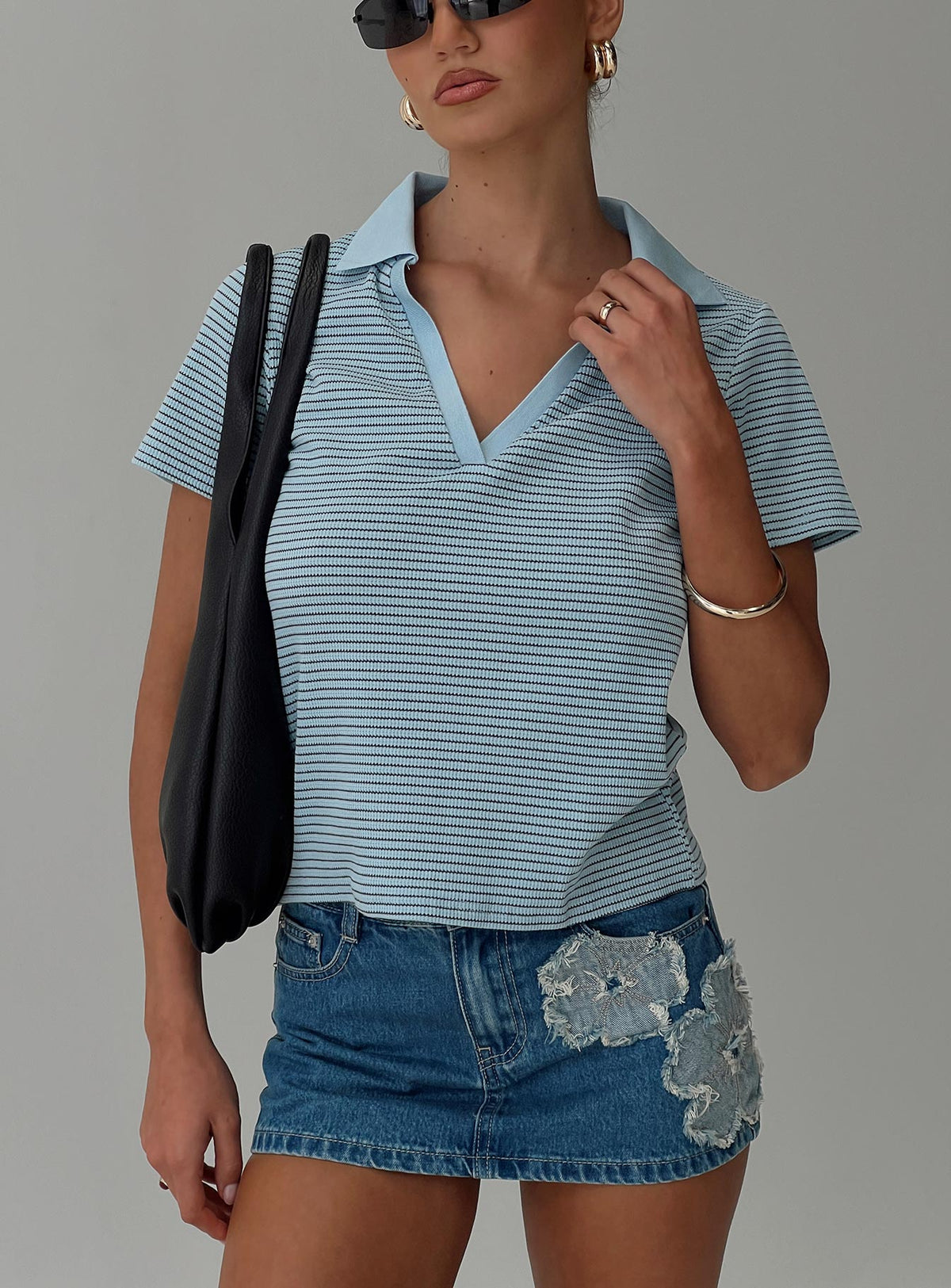 back view of model wearing Princess Polly Ralphy Collared Top Blue Stripe Short Sleeves V-Neck 