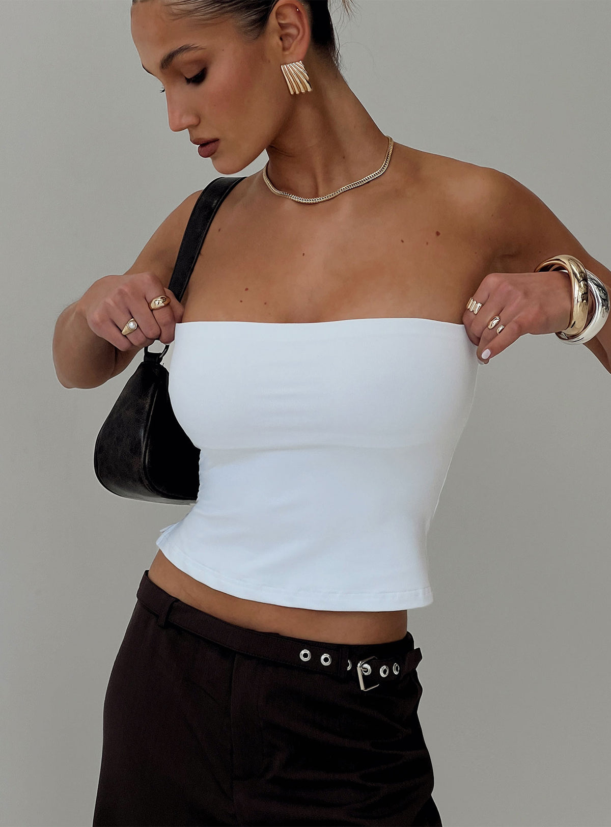 back view of model wearing Princess Polly Aurorah Strapless Top White Sleeveless straight 