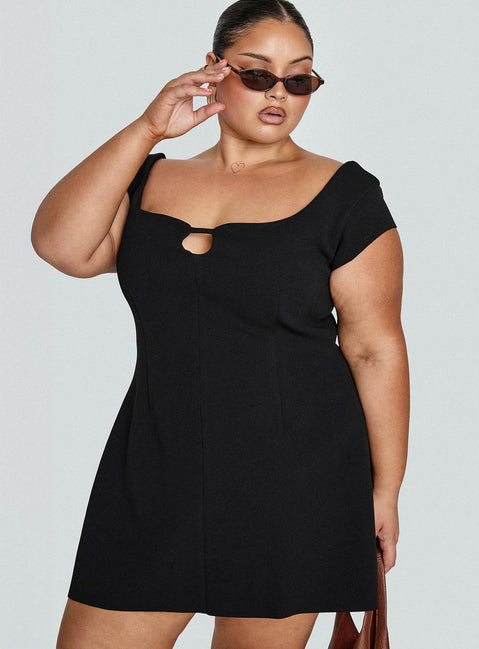 side view of model wearing Princess Polly Sylvette Mini Dress Black Curve Scoop Neck 