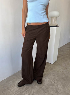 side view of model wearing Princess Polly Khane Low Rise Wide Leg Pant Brown Pinstripe Low Rise Pants Pants 