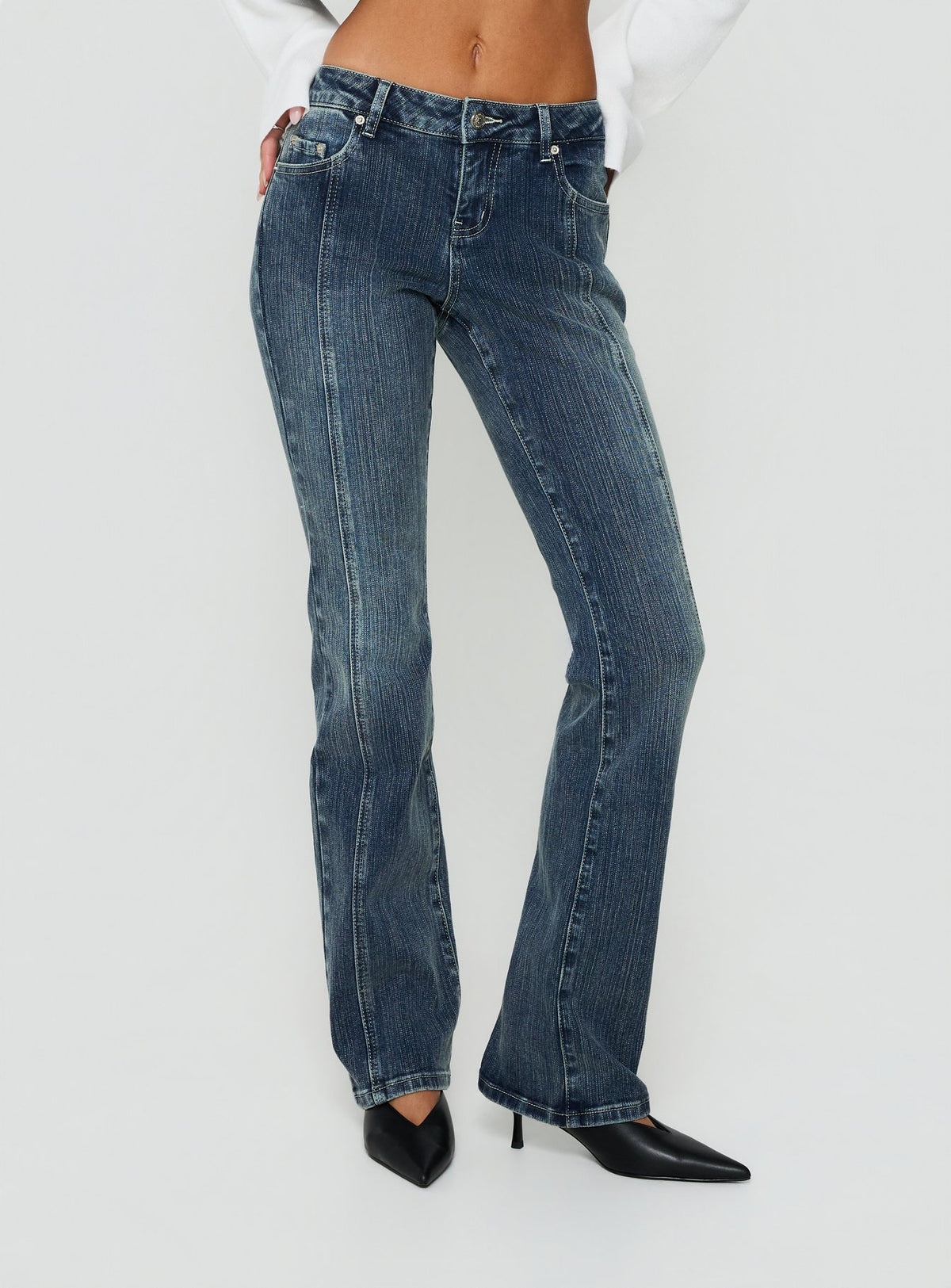 Featuring Palaces Low Rise Ringspun Bootleg Jeans Dark Indigo womens-jeans front view of model wearing Princess Polly