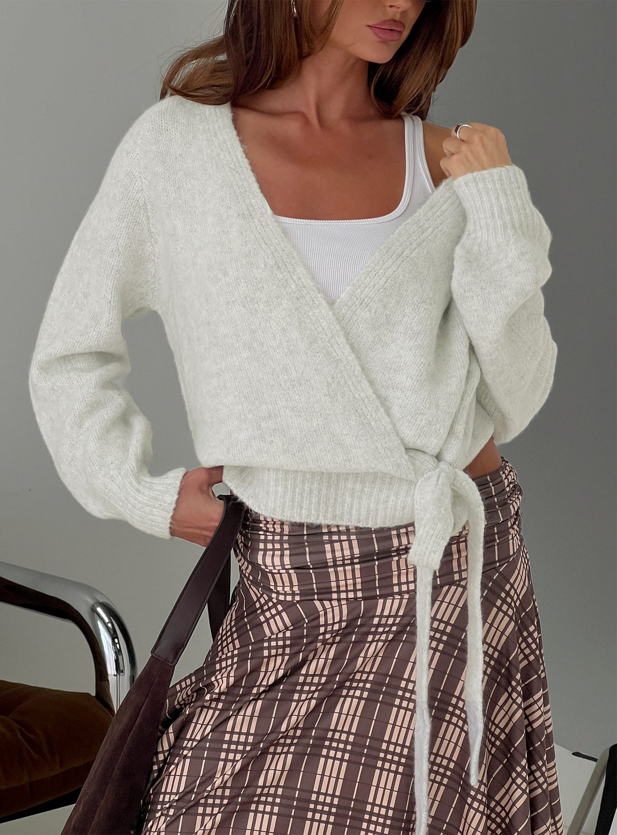 front view of model wearing Princess Polly Daelan Wrap Knit Cardigan Grey Marle Cropped Jumpers Jumpers 