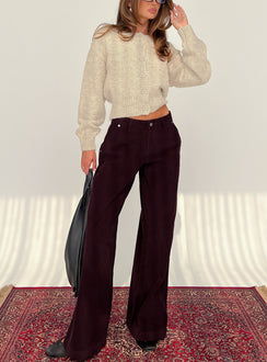 front view of model wearing Princess Polly Jacynda Low Waist Wide Leg Corduroy Jeans Currant Mid Rise Jeans Jeans 