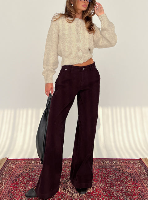 front view of model wearing Princess Polly Jacynda Low Waist Wide Leg Corduroy Jeans Currant Mid Rise Jeans Jeans 