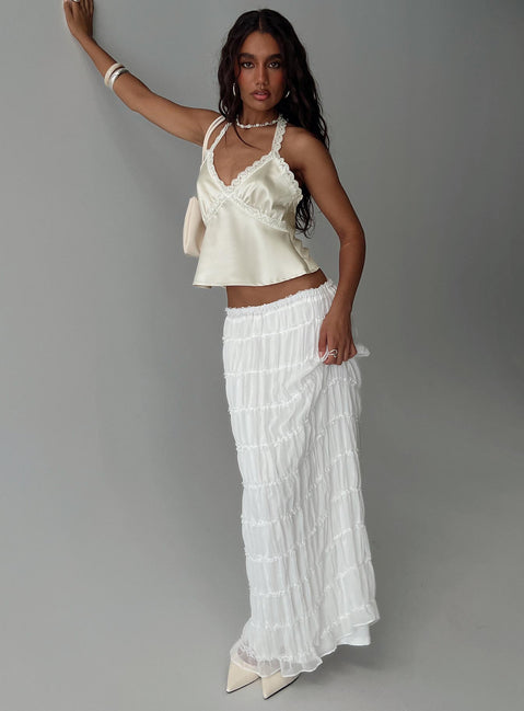   side view of model wearing Princess Polly Estefania Maxi Skirt White Maxi Skirts Skirts 