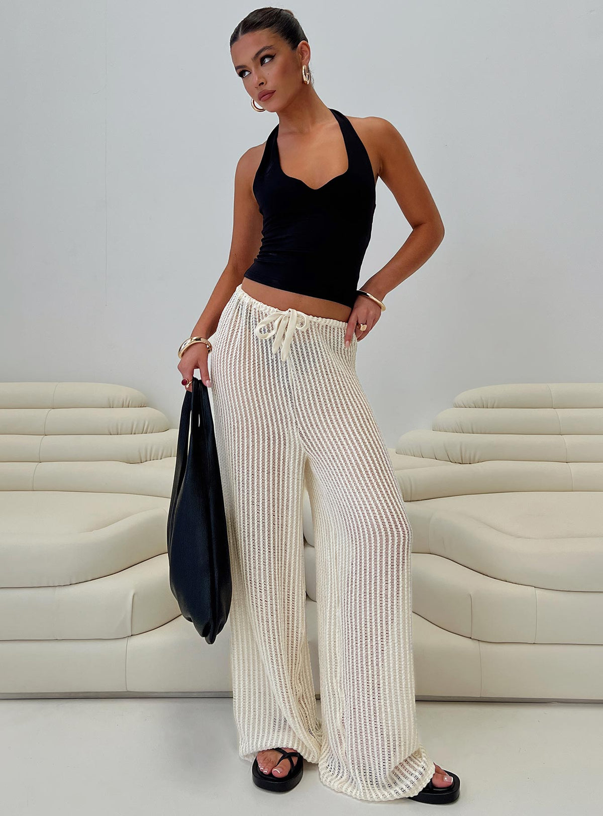 side view of model wearing Princess Polly Darcie Knit Pants Beige High Rise Pants Pants 