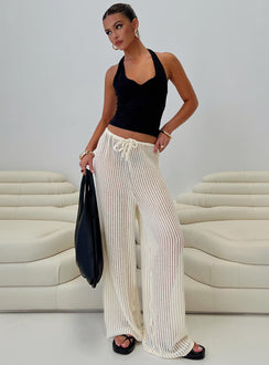 side view of model wearing Princess Polly Darcie Knit Pants Beige High Rise Pants Pants 
