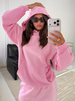 Showcasing the AT Pullover Oversized Hoodie in Washed Pink womens-jumpers with long length and hooded neckline front view of model wearing Princess Polly