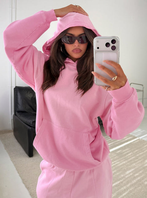 Showcasing the AT Pullover Oversized Hoodie in Washed Pink womens-jumpers with long length and hooded neckline front view of model wearing Princess Polly