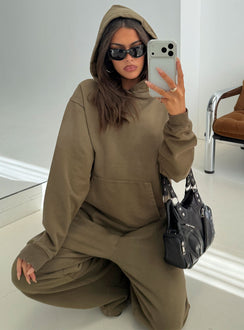 Showcasing the AT Pullover Oversized Hoodie Washed Olive in womens-jumpers with long fit detail view of model wearing Princess Polly
