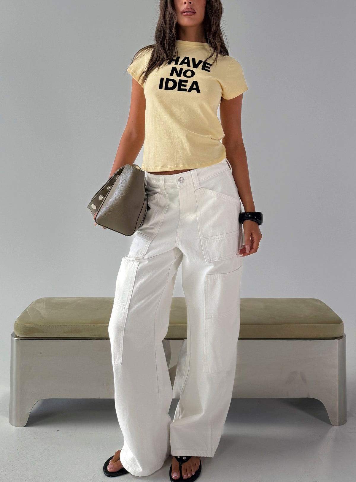 Showcasing Mistree Mid Rise Baggy Cargo Jeans White in womens-jeans with mid-rise front view of model wearing Princess Polly