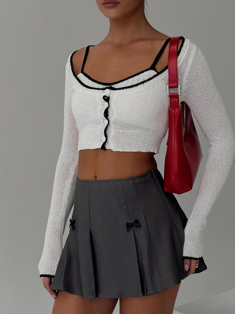   side view of model wearing Princess Polly Little Bow Peep Mini Skirt Grey Mini Skirts Skirts 