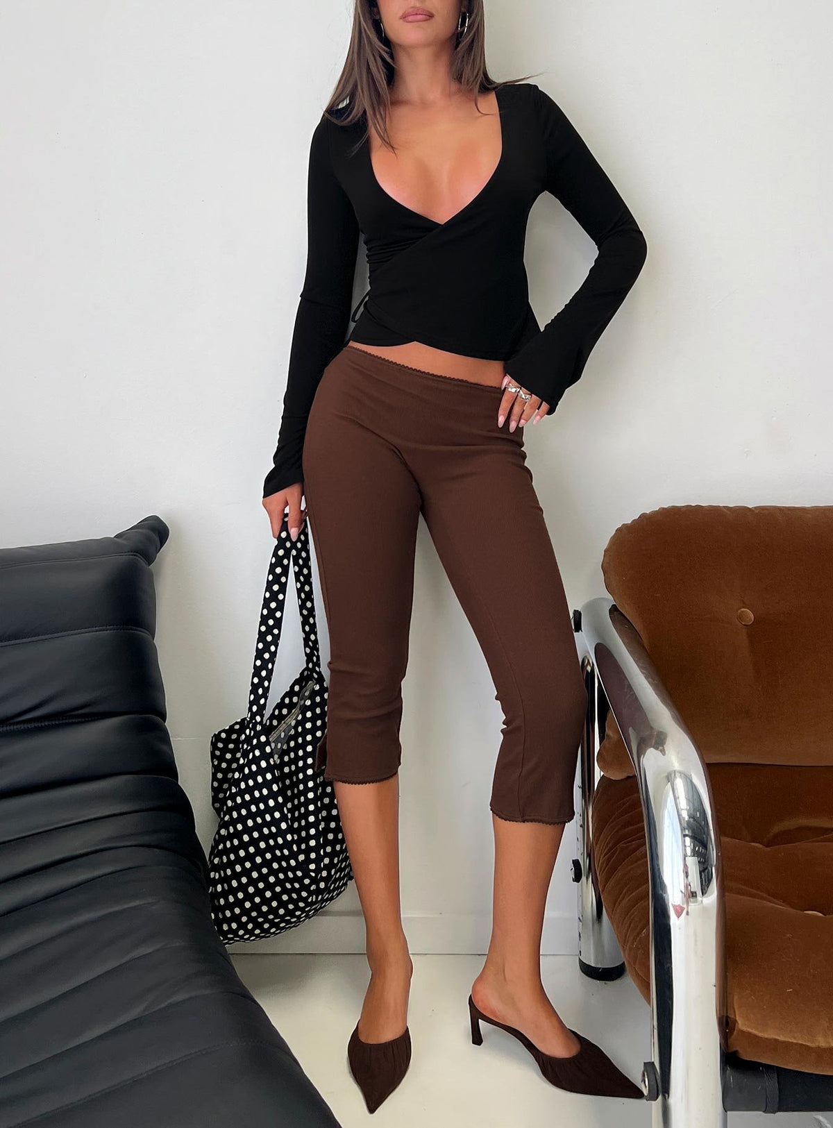 Featuring the Baseline Rib Capri Pants Chocolate in womens-regular-pants with high-rise side view of model wearing