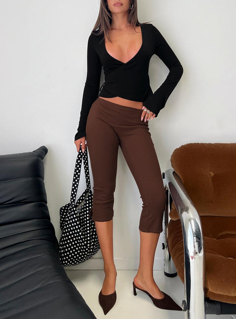 Featuring the Baseline Rib Capri Pants Chocolate in womens-regular-pants with high-rise side view of model wearing