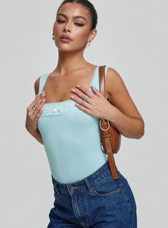side view of model wearing Princess Polly Keating Bodysuit Baby Blue Sleeveless Bodysuit 