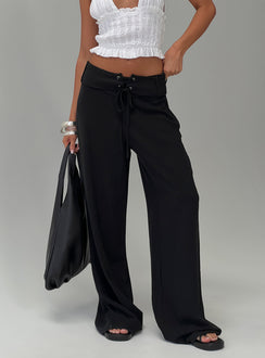 front view of model wearing Princess Polly Raymonde Pants Black High Rise Pants Pants 