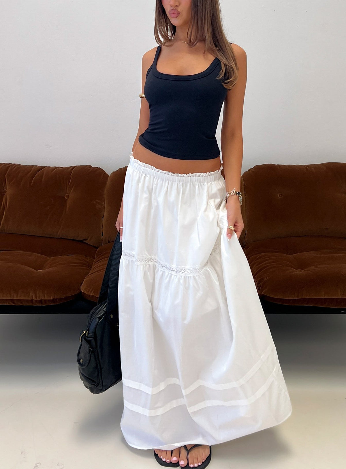 Showcasing the Meanna Tiered Maxi Skirt White in womens-skirts with maxi length front view of model wearing Princess Polly