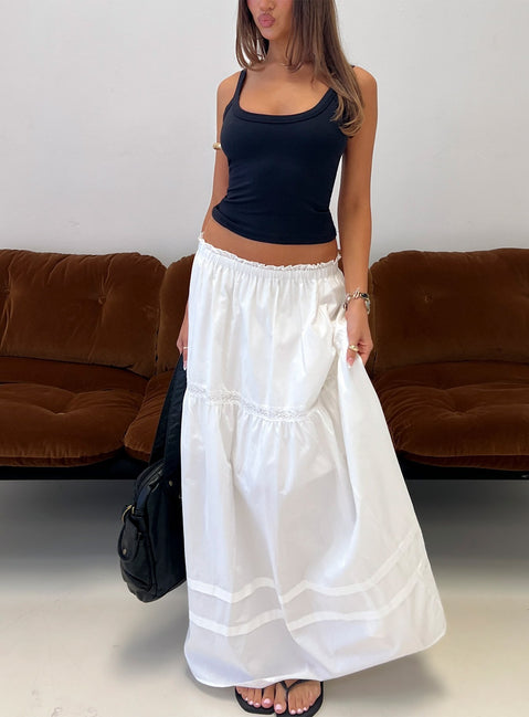 Showcasing the Meanna Tiered Maxi Skirt White in womens-skirts with maxi length front view of model wearing Princess Polly