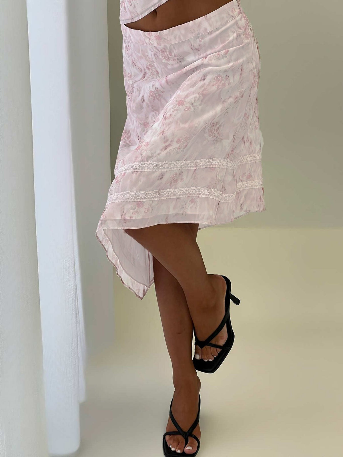 back view of model wearing Princess Polly Avaline Asymmetrical Midi Skirt Pink Skirts 